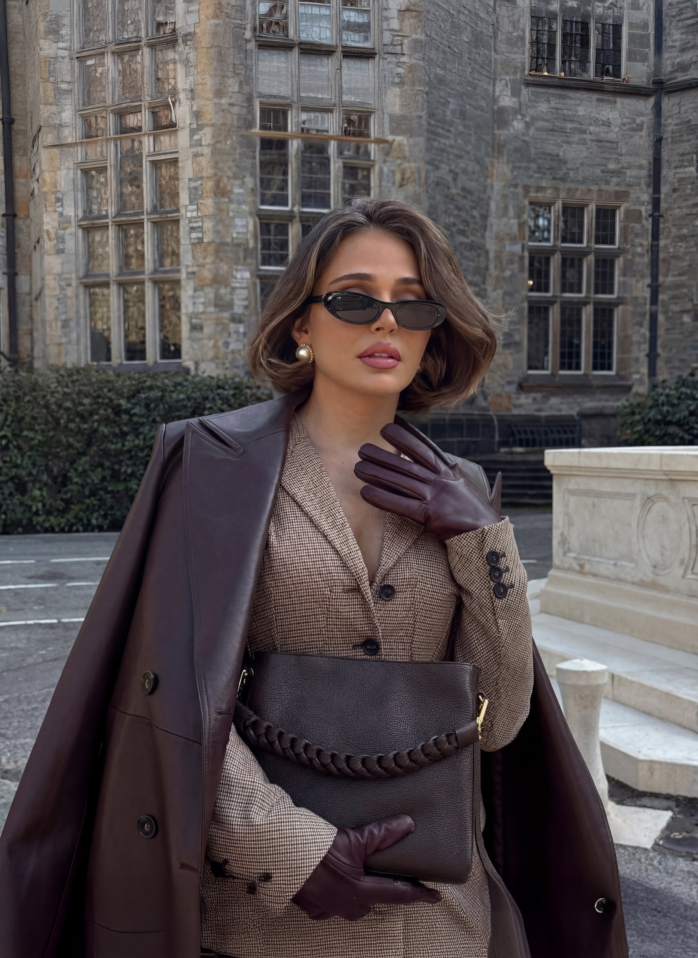 Borsa Braid in pelle Dollaro Testa di Moro